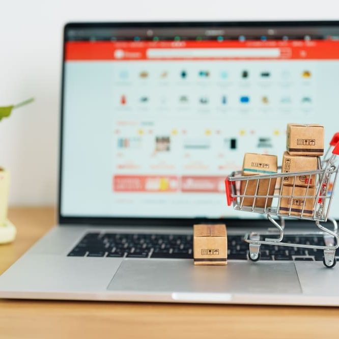 Boxes,With,Shopping,Cart,On,A,Laptop,Computer.,Online,Shopping,